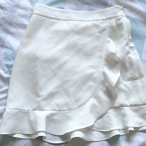 White ruffle mini skirt